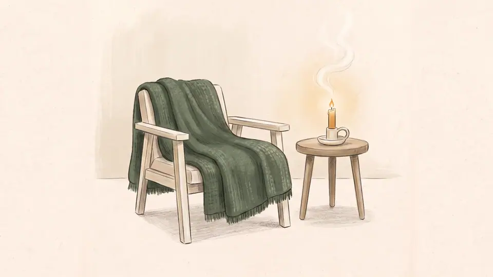 Illustratsioon õdusast toast küünla ja pehme pleediga.